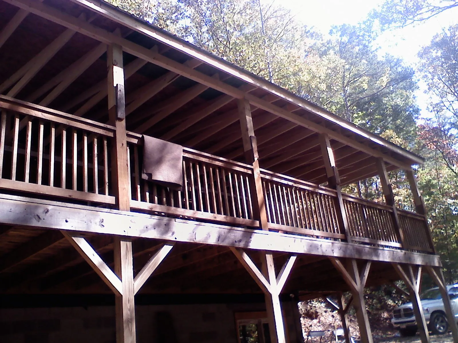 Timber framing under a new elevated porch and deck — Roof Leak Repair in Spring Branch by Roofing Brothers